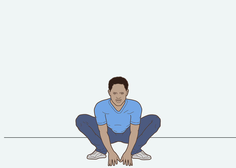 Άτομο καθισμένο στα γόνατα σε στάση «βάτραχου».
